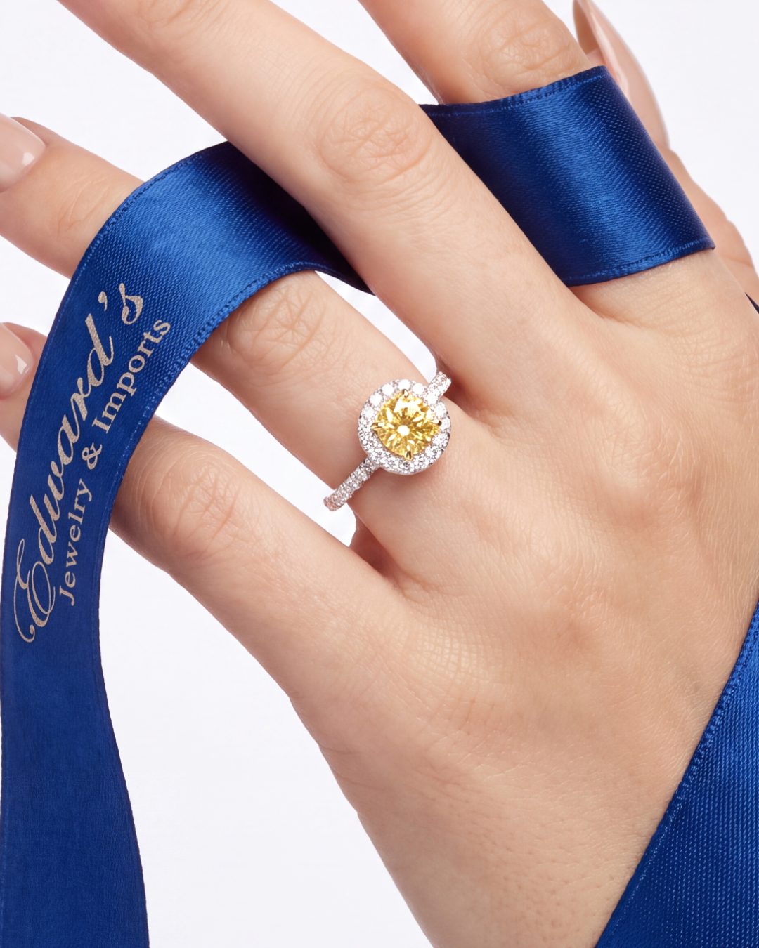 1.45ctw. Fancy Intense Yellow Diamond and White Diamond in 18K Yellow Gold and Platinum Ring on model - Edward&