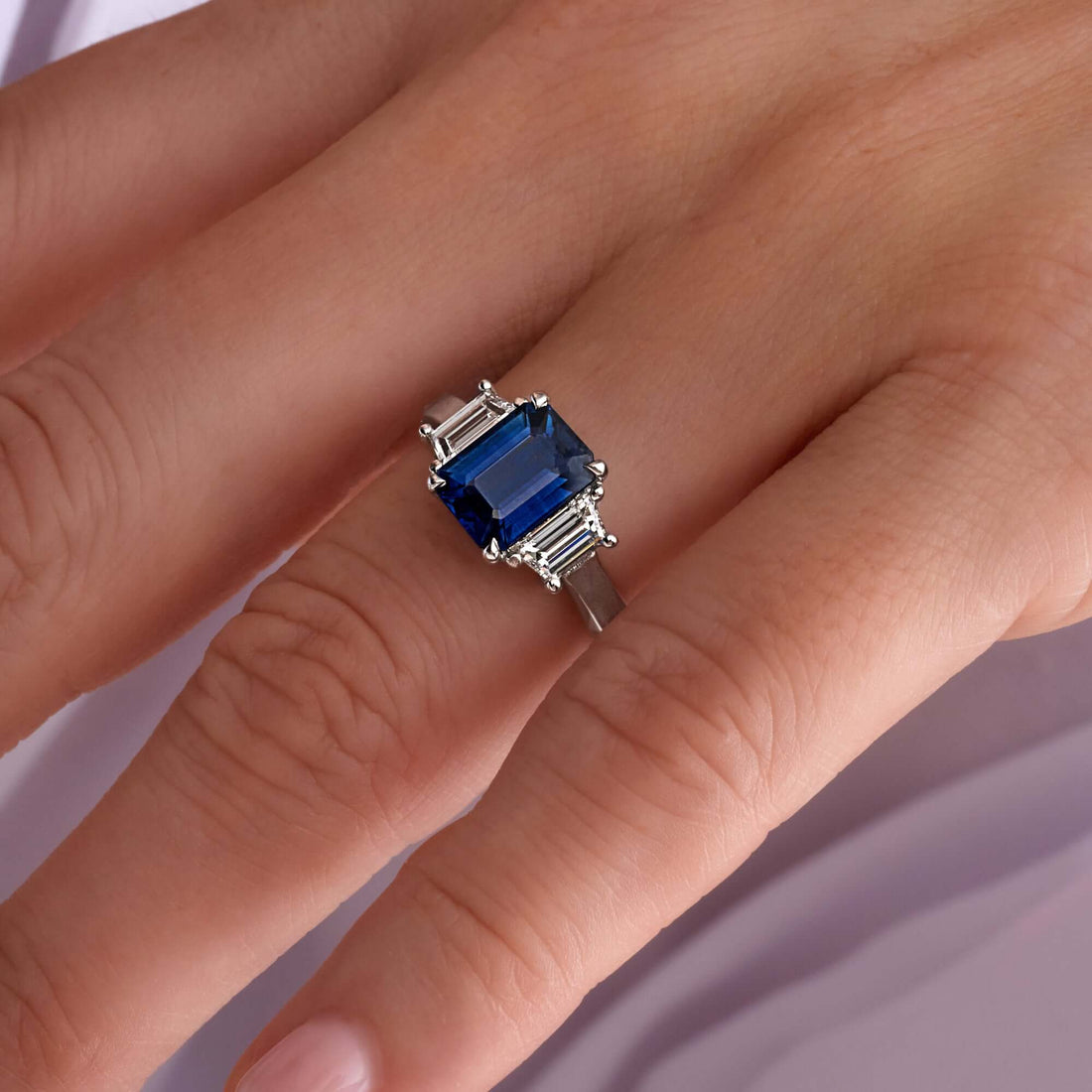 3.44 CT. Emerald Cut Blue Sapphire and Trapezoid Cut Diamond Three Stone Ring in Platinum - Three Stone Ring