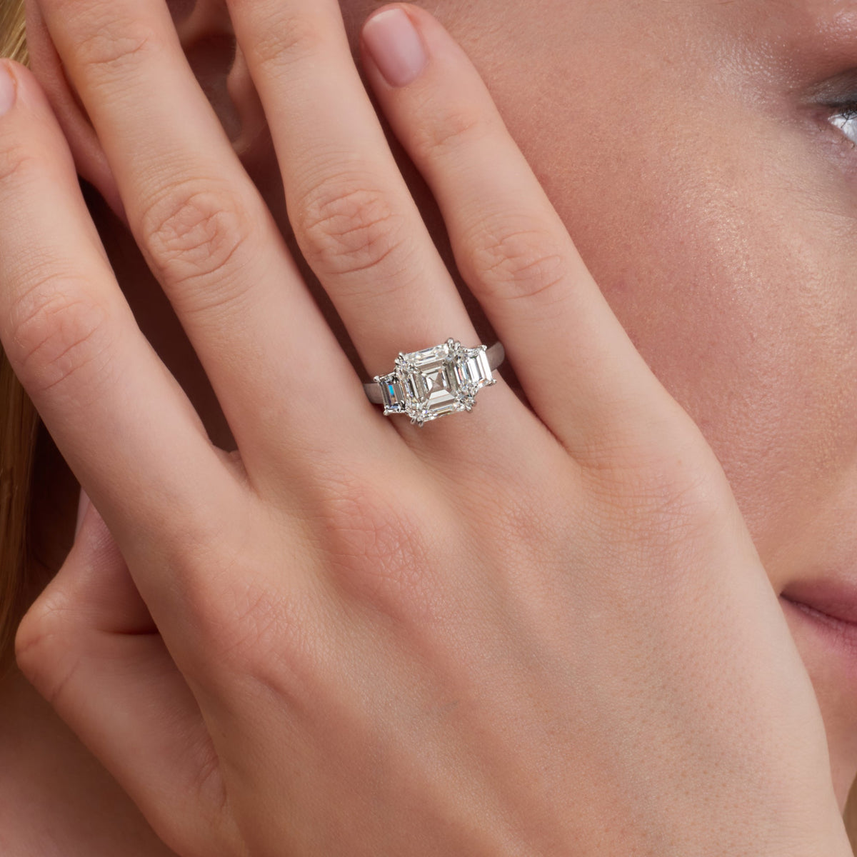 6.65 CT. Asscher and Trapezoid Cut Three Stone Diamond Ring in Platinum - worn on model