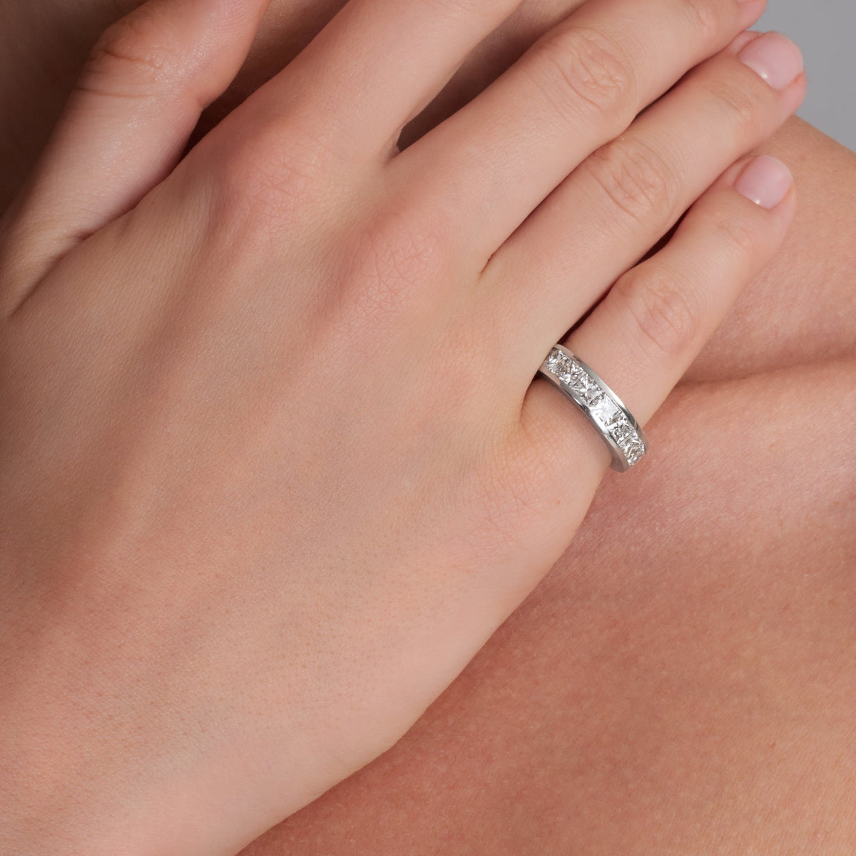 5.38 CT. Channel Set Princess Cut Diamond Eternity Ring in Platinum - worn on model