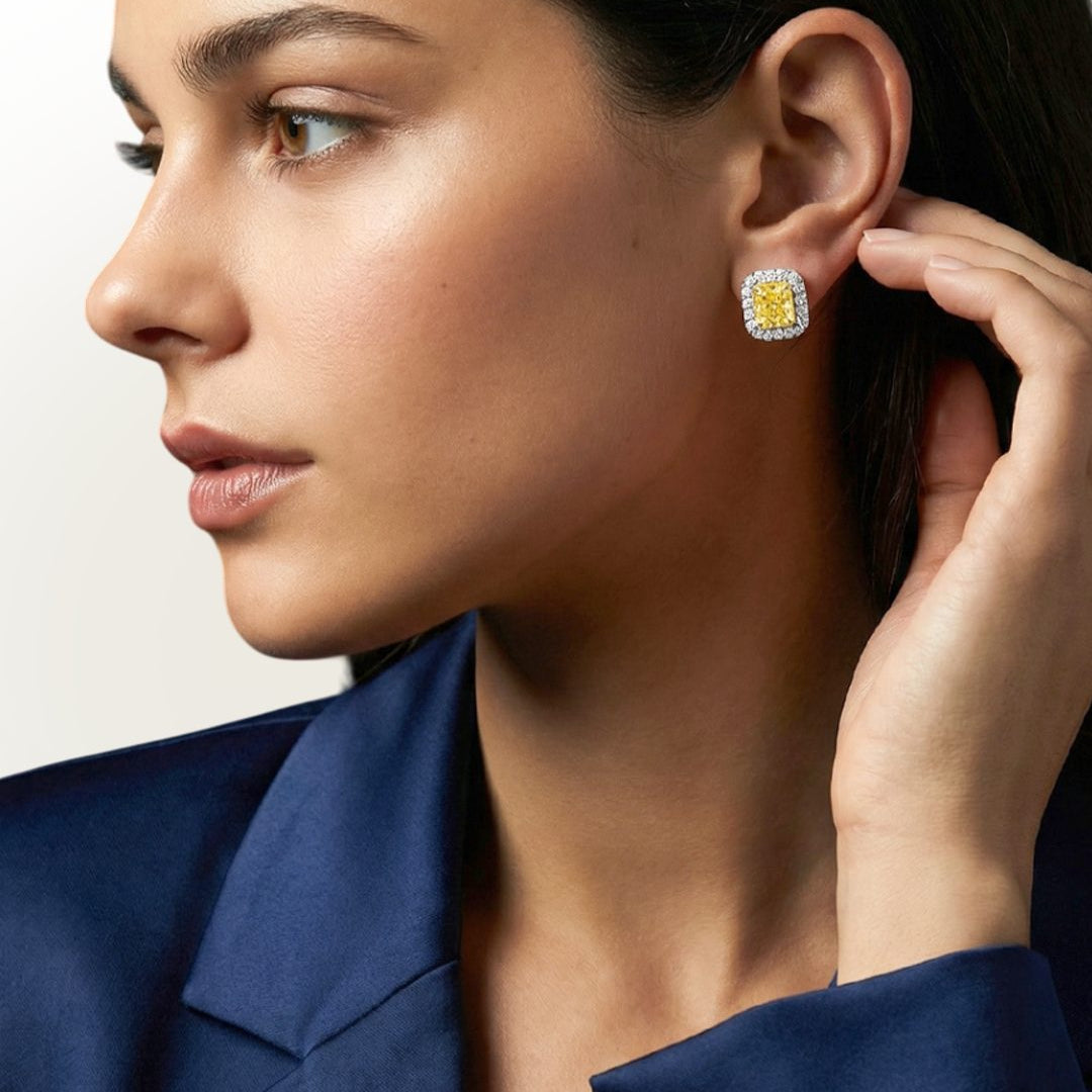 2.67 CT Fancy Yellow Diamond & Round Brilliant Diamond Halo Stud Earrings in 14K White Gold, worn on model, view 1 - fine jewelry in San Francisco