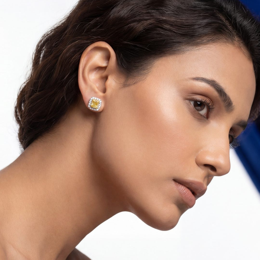 2.67 CT Fancy Yellow Diamond & Round Brilliant Diamond Halo Stud Earrings in 14K White Gold, worn on model, view 2 - fine jewelry in San Francisco