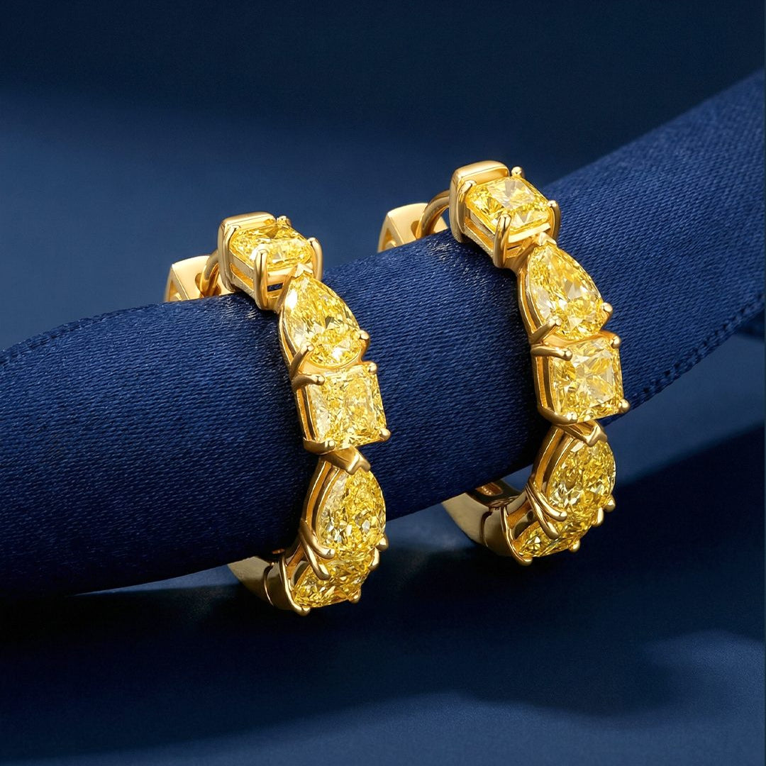 3.10 CT Fancy Yellow Mixed Cut Diamond Hoop Earrings, worn on model, view 1 - fine jewelry in San Francisco