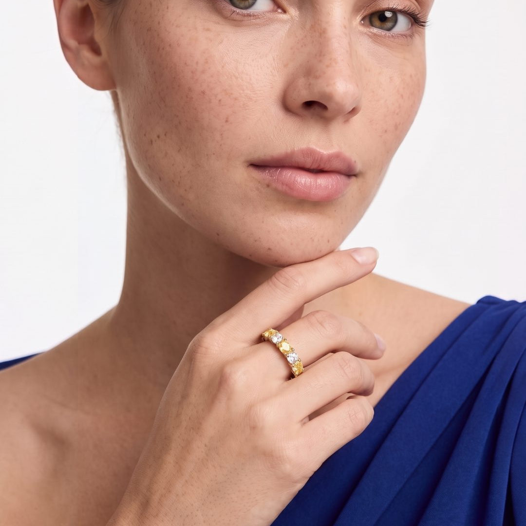 1.34 CT alternating oval fancy yellow diamond and round brilliant diamond ring in 18K yellow gold and platinum, worn on model - fine jewelry in San Francisco