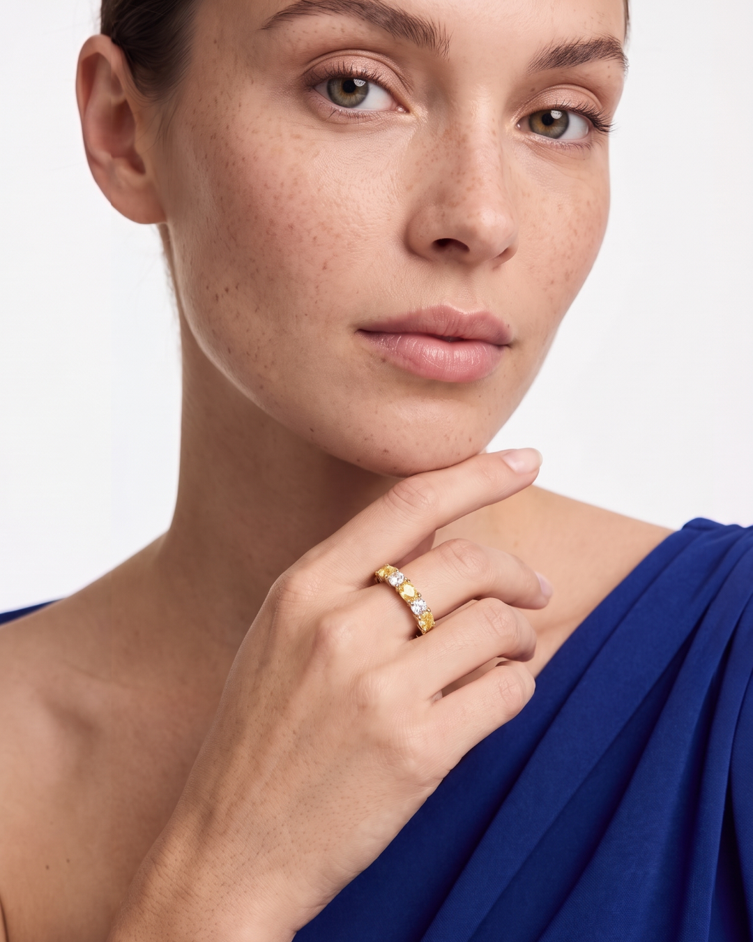 1.34 CT alternating oval fancy yellow diamond and round brilliant diamond ring in 18K yellow gold and platinum, worn on model - fine jewelry in San Francisco