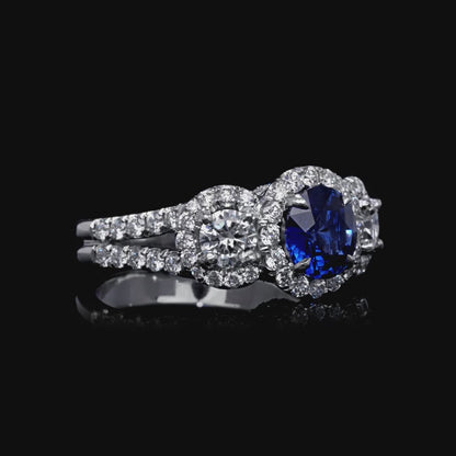 3.05 CT Round Brilliant Blue Sapphire and Diamond Halo Three Stone Ring in Platinum