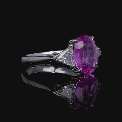 3.82 CT. Oval Cut Pink Sapphire and Triangle Cut Diamond Three Stone Ring in Platinum