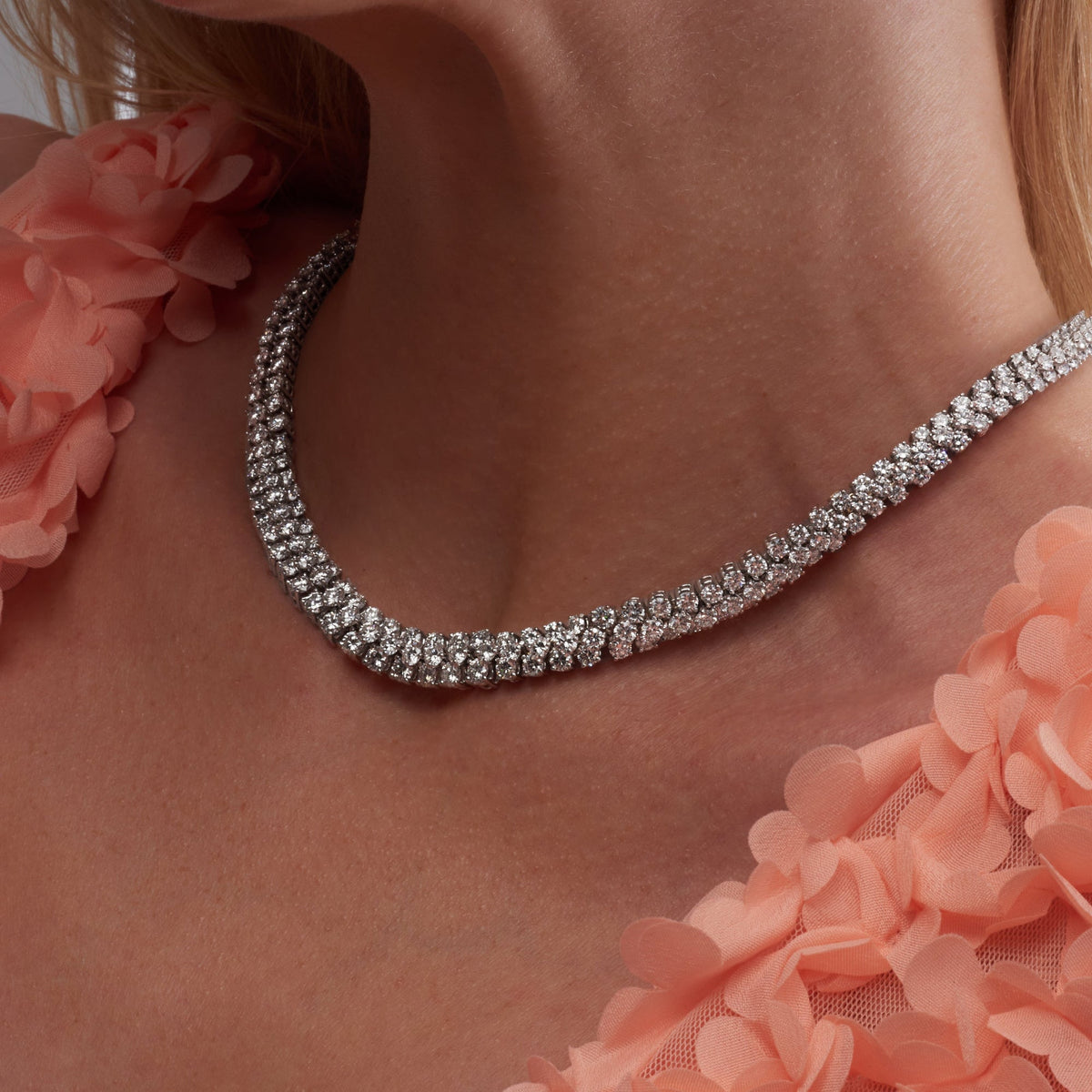37.25 CT Round Brilliant Diamond Stacked Tennis Necklace in 18K White Gold, worn on model, view 4 - fine jewelry in San Francisco