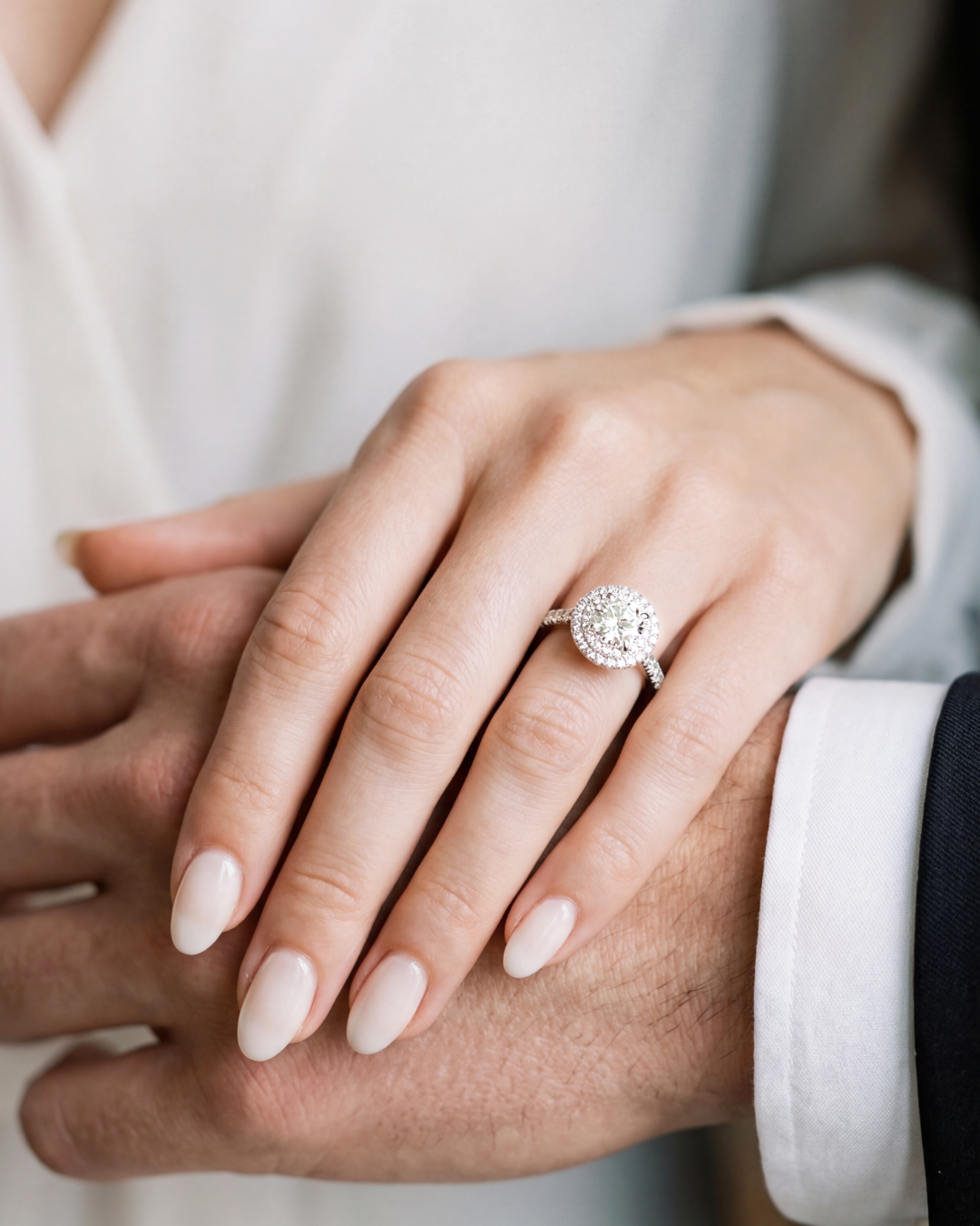 2.23 CT Round Brilliant & Double Halo Diamond Ring with Pavé Band in Platinum, worn on model - fine jewelry in San Francisco