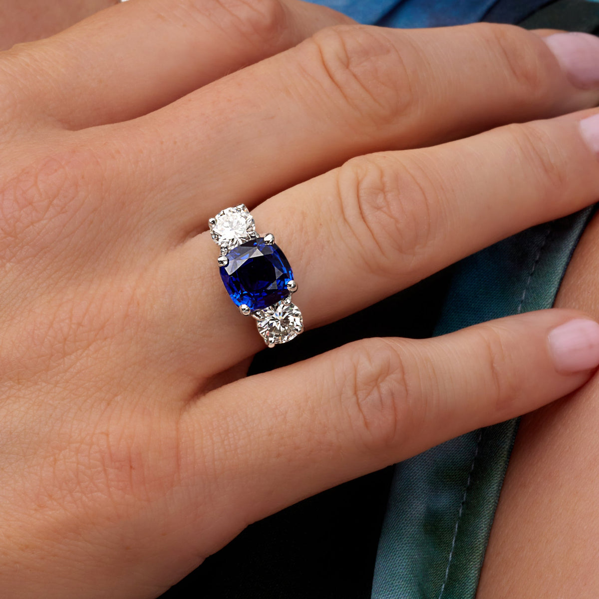 5.85 CT. Sapphire & Round Brilliant Diamond Three Stone Ring in Platinum - worn on model