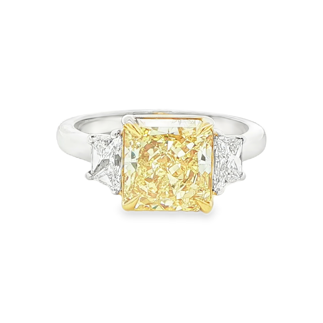 3.00 CT radiant cut fancy intense yellow diamond three stone ring front view