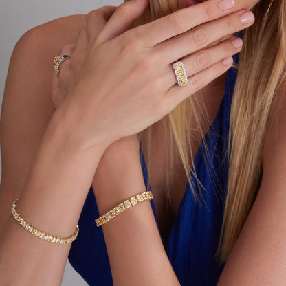 16.35 CTW. Fancy Yellow Diamond and Emerald Cut Diamond Bracelet in 18K White and Yellow Gold - worn on model