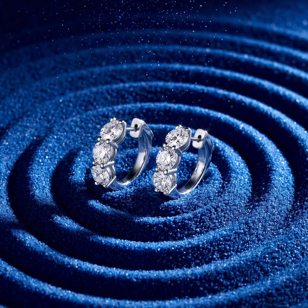 4.26 CT. Round Brilliant Three Stone Diamond Huggie Earrings in 14K White Gold on model - Edward&