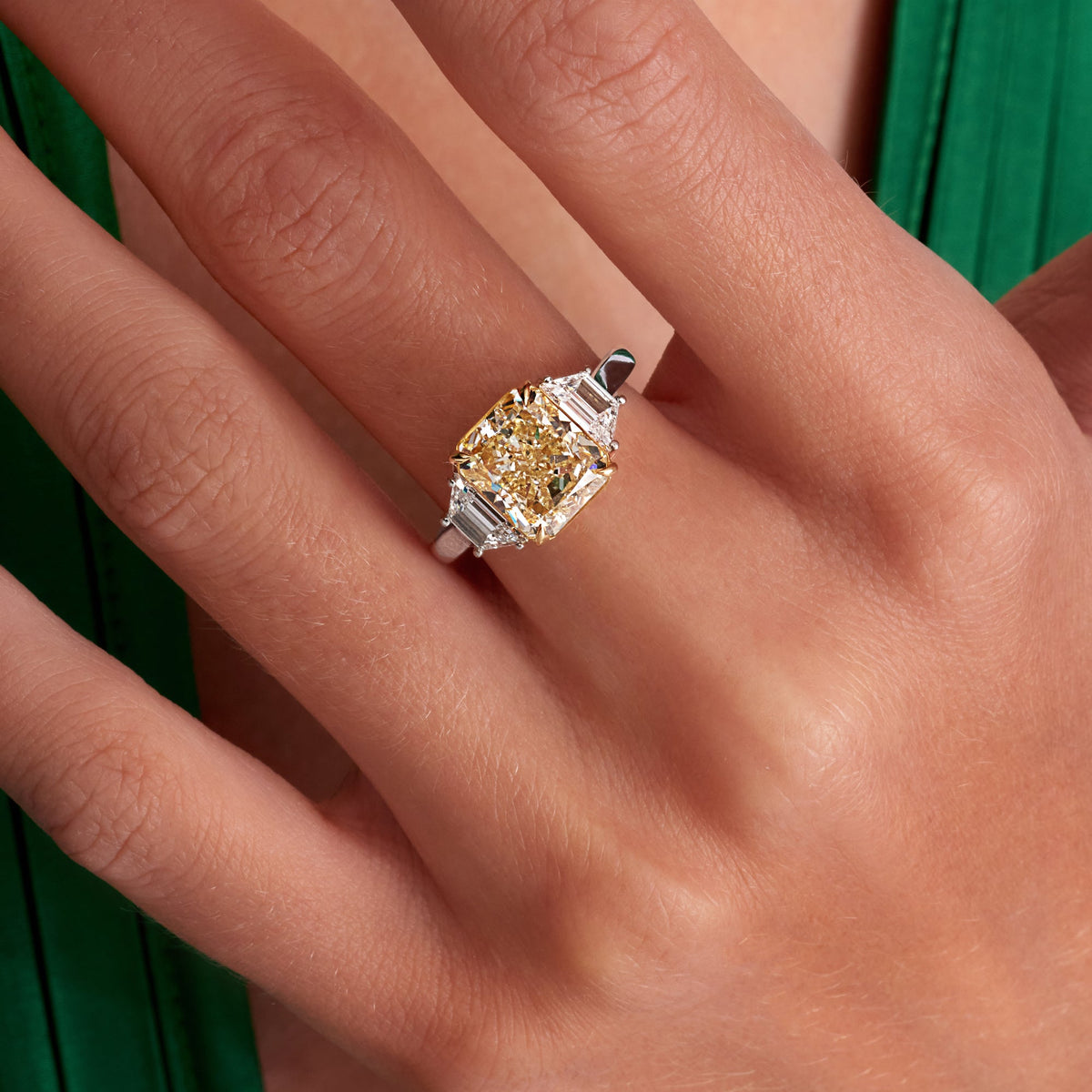 4.89 CT. Radiant Cut WX Yellow Diamond and Trapezoid Diamond Three Stone Ring in 18K Yellow Gold and Platinum - worn on model