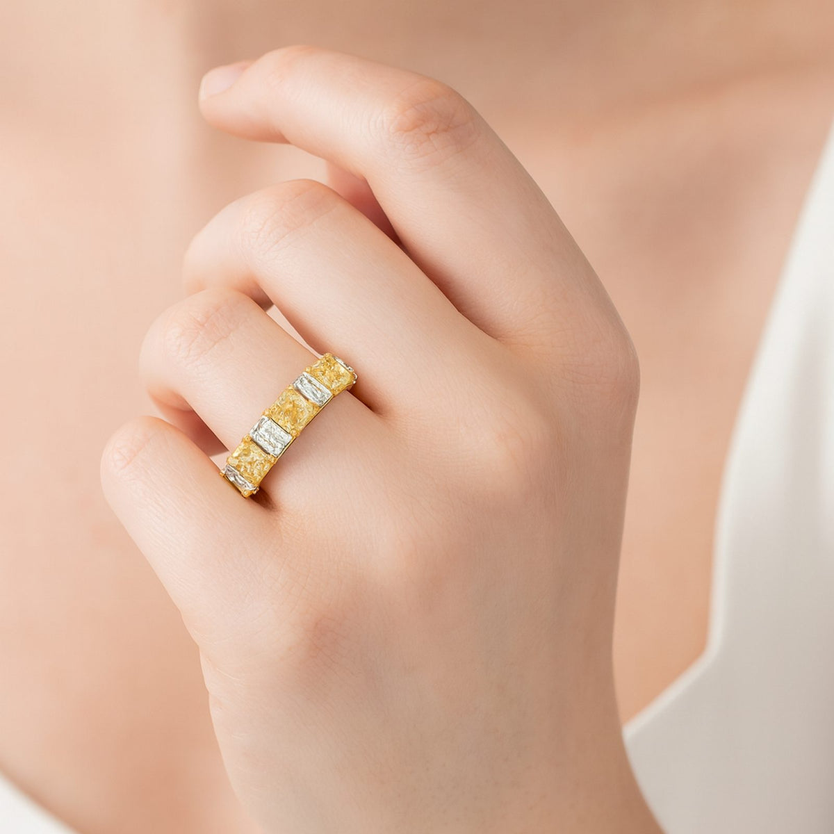 5.77 CT. Alternating Radiant Cut Fancy Yellow Diamond and Emerald Cut Diamond Eternity Band in 18K Yellow Gold and Platinum styled view