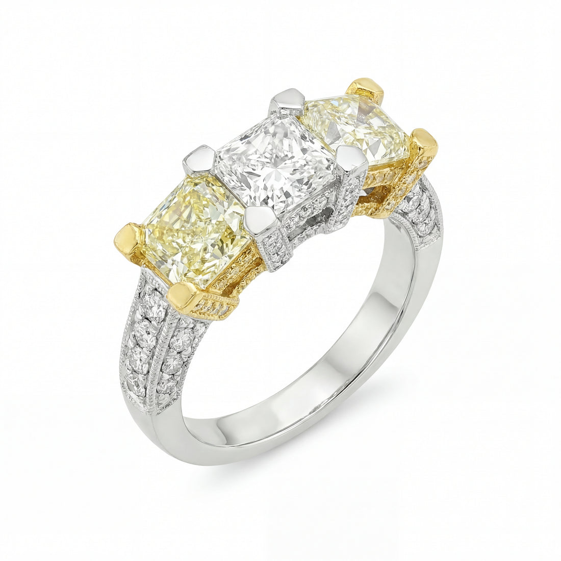 3.11 CT. Three Stone Ring with Fancy Yellow and White Radiant Cut Diamonds in 18K Yellow Gold and Platinum