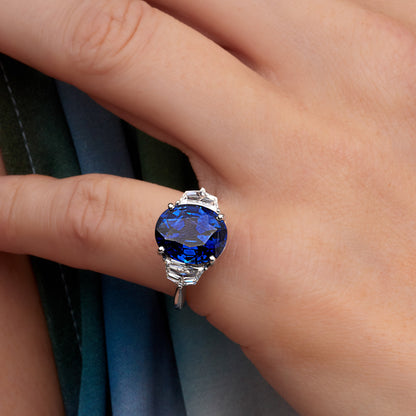 8.93 CT. Oval Cut Blue Sapphire and Half Moon Diamond Three Stone Ring in Platinum