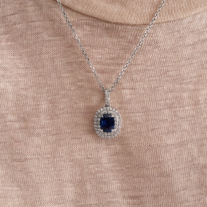 2.34 CT. Oval Cut Blue Sapphire and Round Brilliant Diamond Halo Pendant Necklace in 14k White Gold