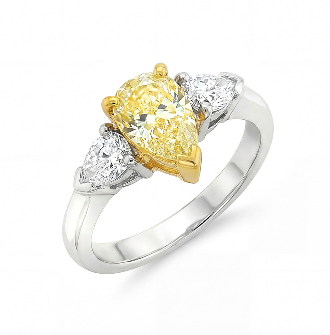 1.35 CT. Three Stone Ring with Fancy Light Yellow Marquise and White Pear Diamonds in 18K Yellow Gold and Platinum