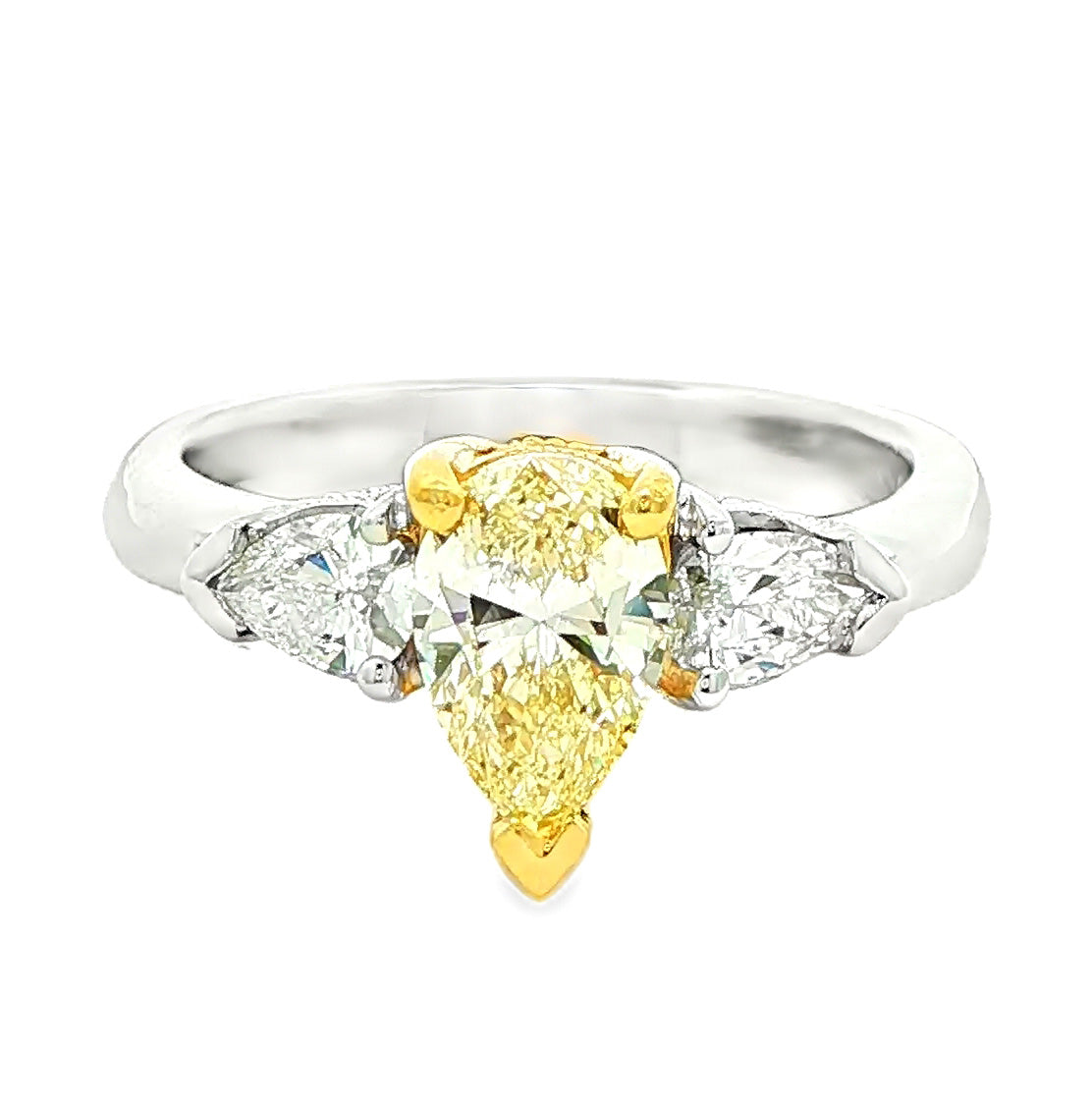 1.35 CT. Three Stone Ring with Fancy Light Yellow Marquise and White Pear Diamonds in 18K Yellow Gold and Platinum