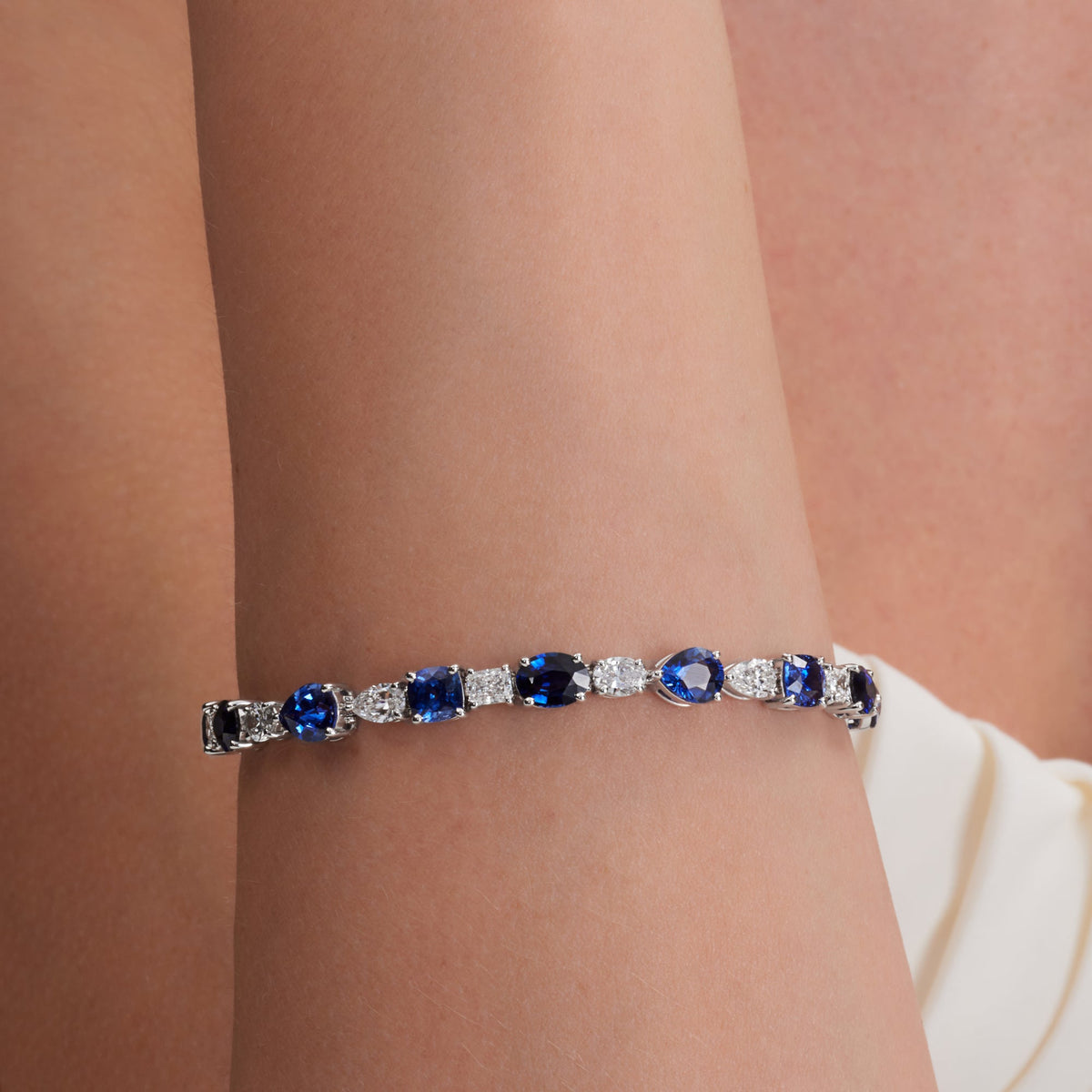 18.99 CT. Alternating Mixed Cut Sapphire and Diamond Tennis Bracelet in 14K White Gold - worn on model