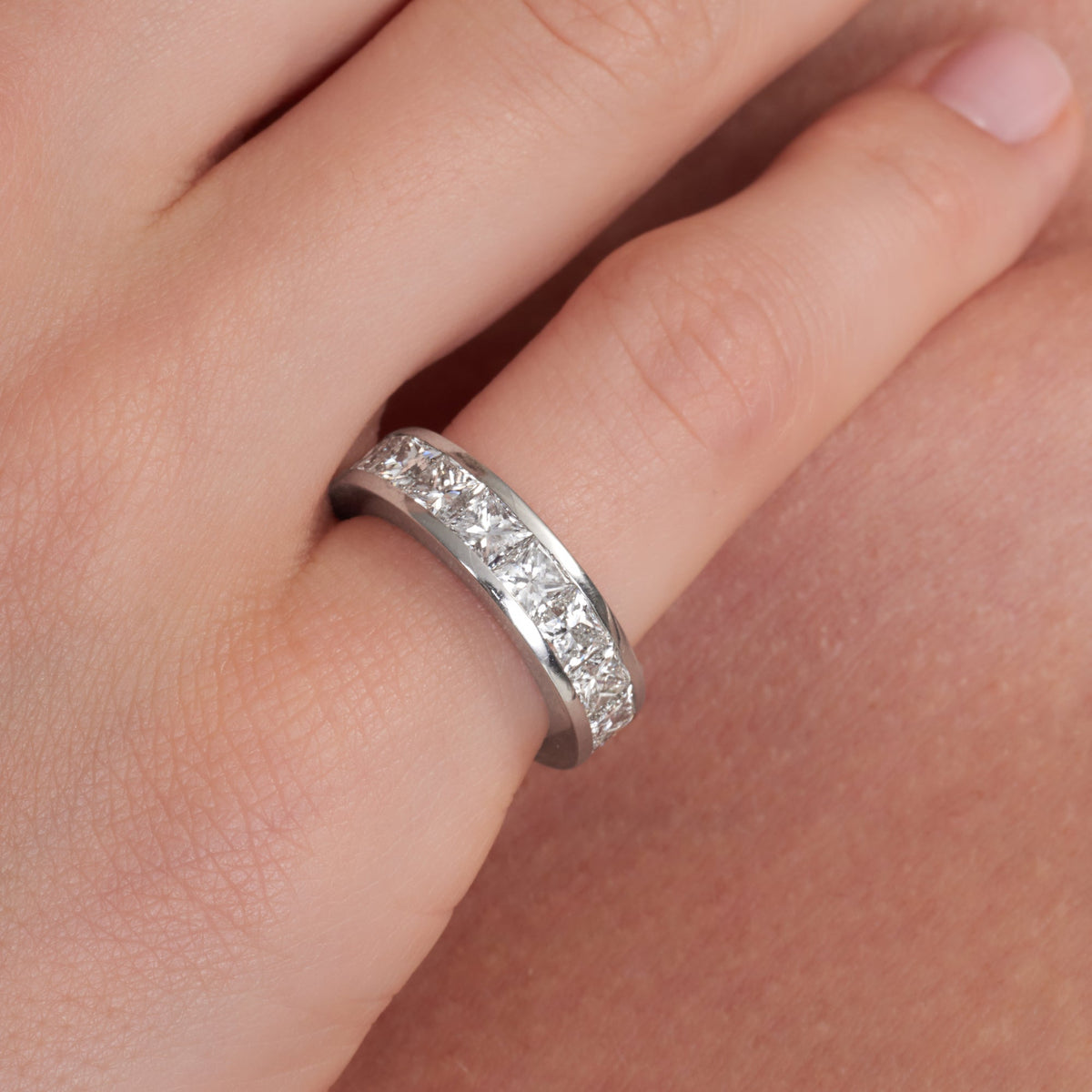 5.38 CT. Channel Set Princess Cut Diamond Eternity Ring in Platinum - worn on model