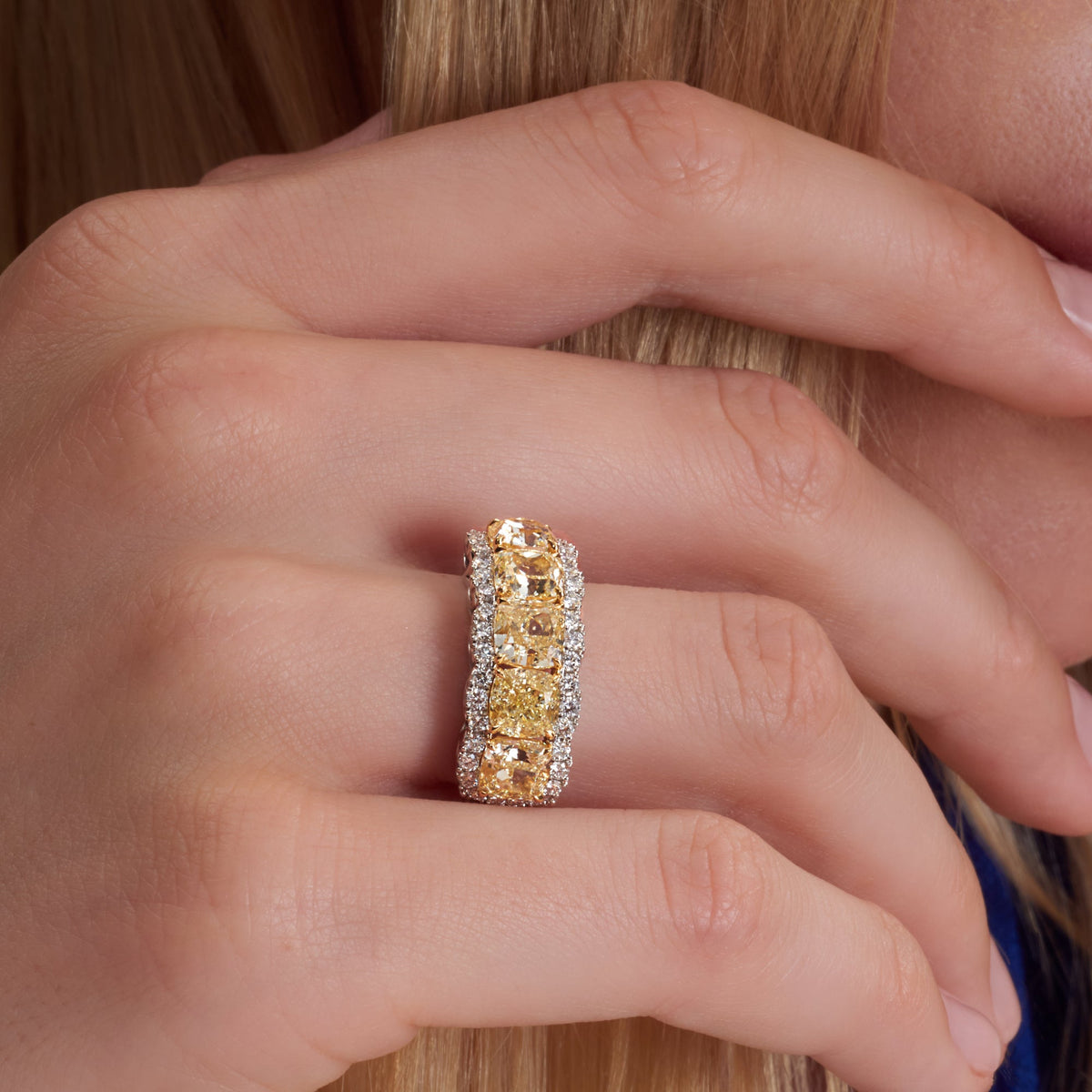 5.54 CT. Fancy Yellow Diamond Five Stone Ring with Diamond Halo in Platinum - worn on model