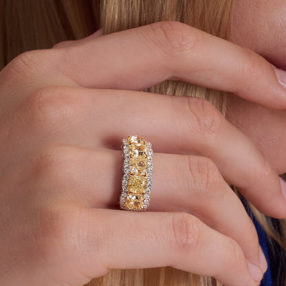 5.54 CT. Fancy Yellow Diamond Five Stone Ring with Diamond Halo in Platinum - worn on model