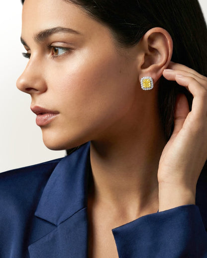 2.67 CT Fancy Yellow Diamond &amp; Round Brilliant Diamond Halo Stud Earrings in 14K White Gold, worn on model, view 1 - fine jewelry in San Francisco