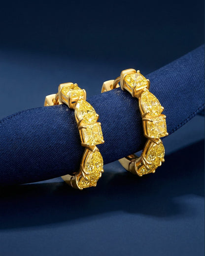 3.10 CT Fancy Yellow Mixed Cut Diamond Hoop Earrings, worn on model, view 1 - fine jewelry in San Francisco
