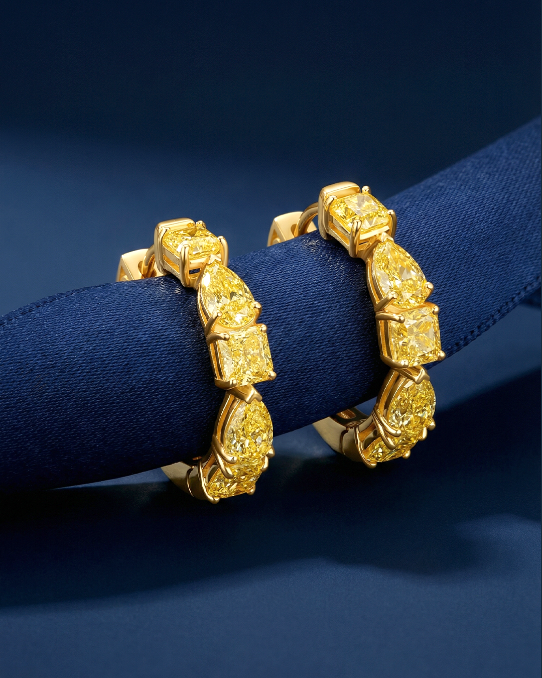 3.10 CT Fancy Yellow Mixed Cut Diamond Hoop Earrings, worn on model, view 1 - fine jewelry in San Francisco