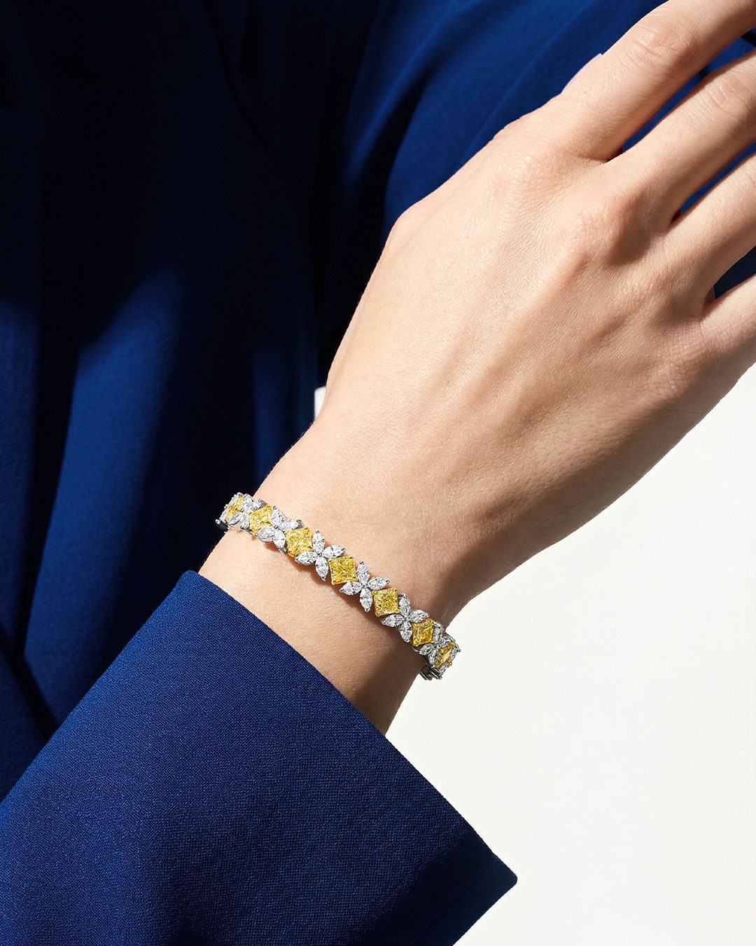 Fancy Yellow Square Diamond and Marquise Diamond Tennis Bracelet in 18K Yellow Gold and Platinum, worn on model - fine jewelry in San Francisco