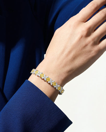 Fancy Yellow Square Diamond and Marquise Diamond Tennis Bracelet in 18K Yellow Gold and Platinum, worn on model - fine jewelry in San Francisco