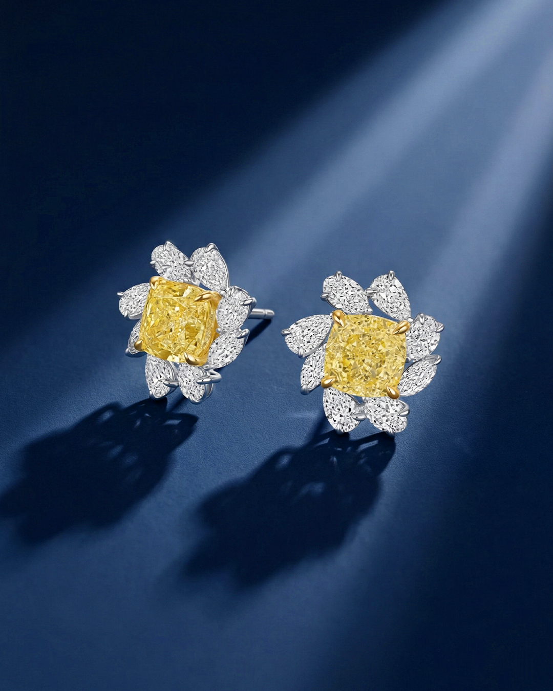 6.14 CT Pear and Cushion Cut Fancy Yellow Diamond Flower Stud Earrings, worn on model - fine jewelry in San Francisco