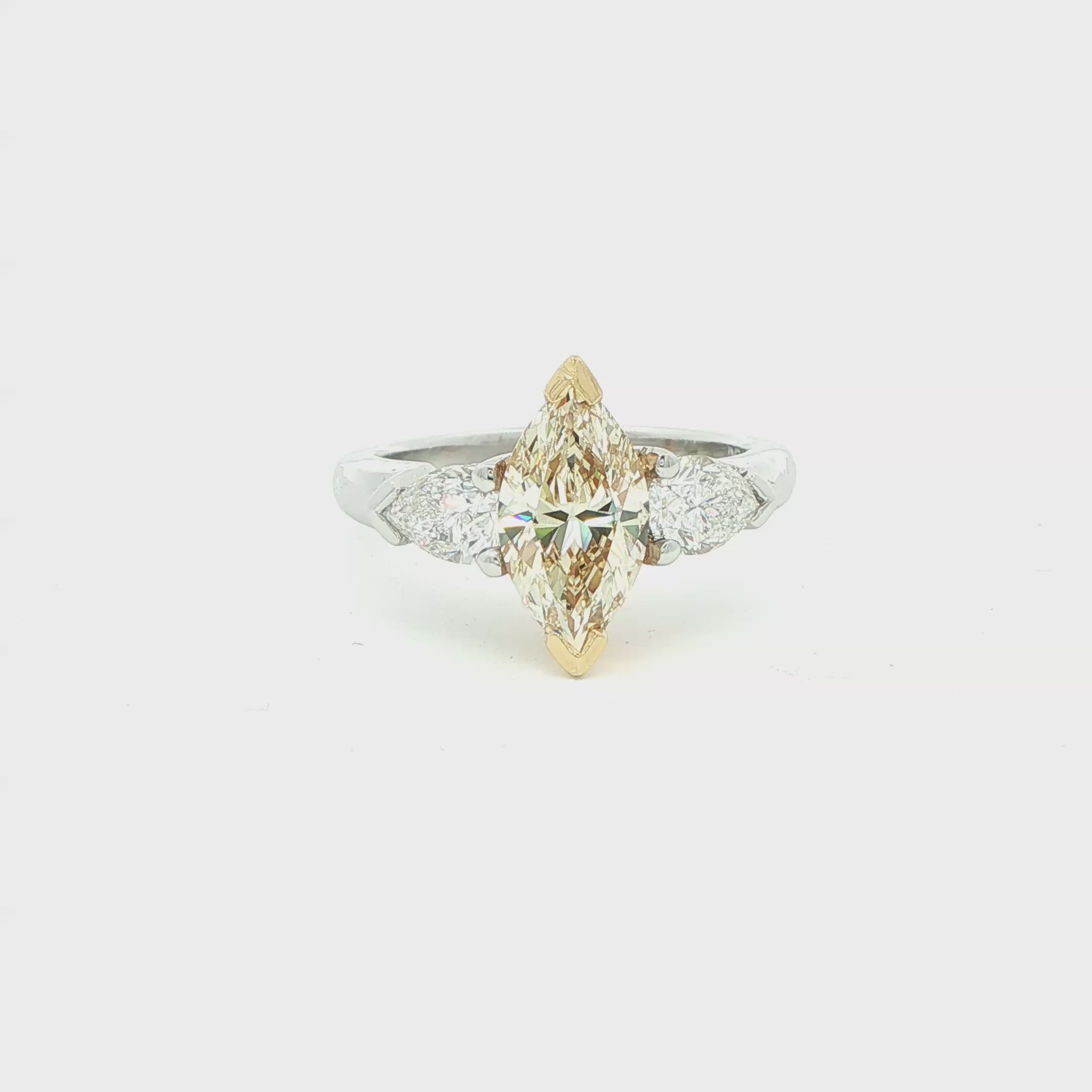 2.46 CT. Three Stone Ring with Fancy Light Yellow Marquise and Pear Diamonds in 18K Yellow Gold and Platinum - Engagement Rings