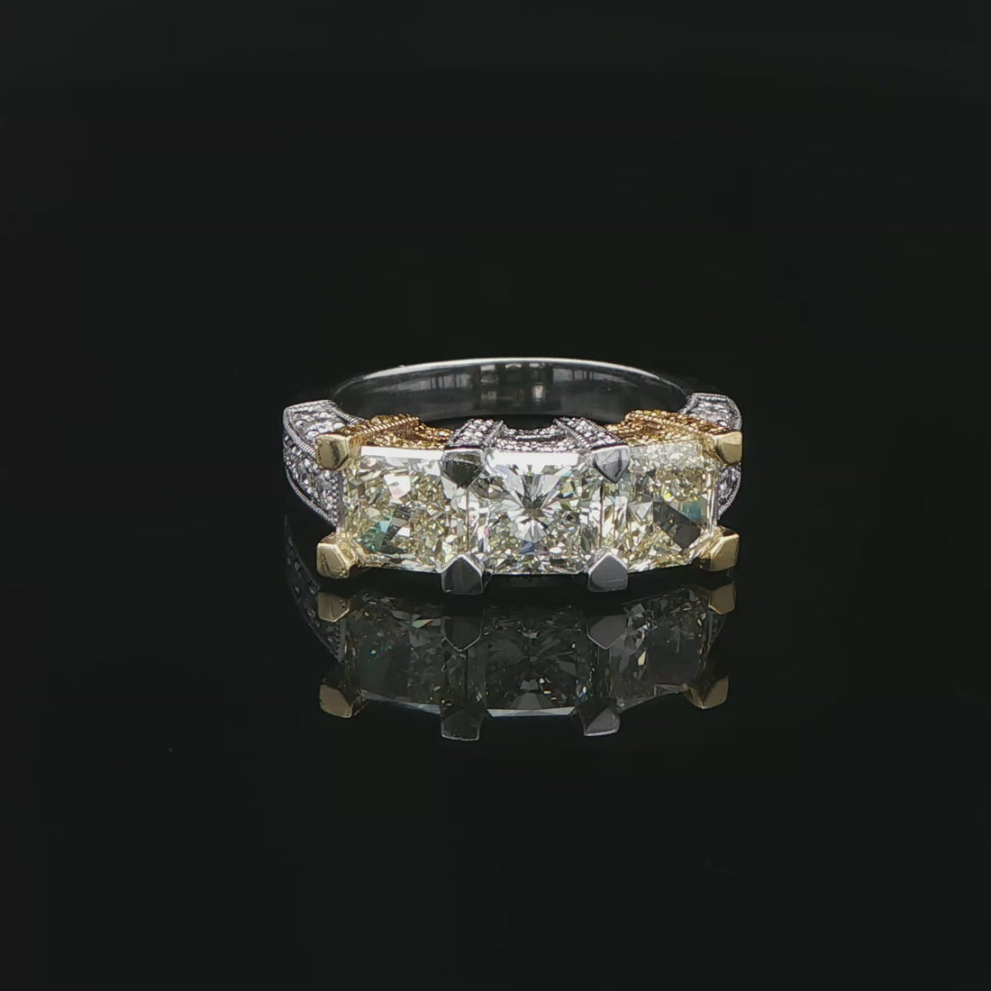 3.11 CT. Three Stone Ring with Fancy Yellow and White Radiant Cut Diamonds in 18K Yellow Gold and Platinum