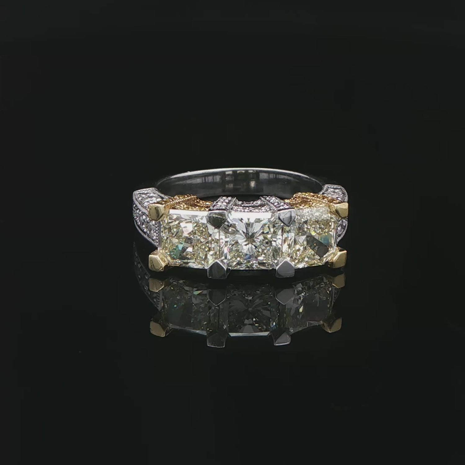 3.11 CT. Three Stone Ring with Fancy Yellow and White Radiant Cut Diamonds in 18K Yellow Gold and Platinum