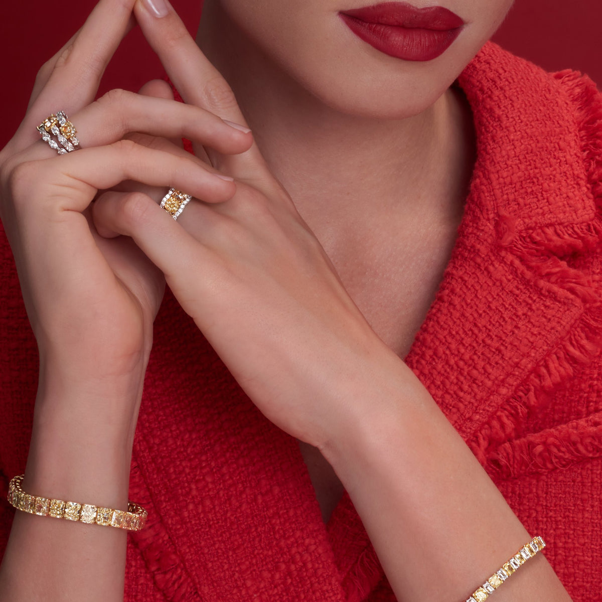 33.52 CT Radiant Cut Fancy Yellow Diamond Tennis Bracelet in 18K Yellow Gold, worn on model, view 4 - fine jewelry in San Francisco