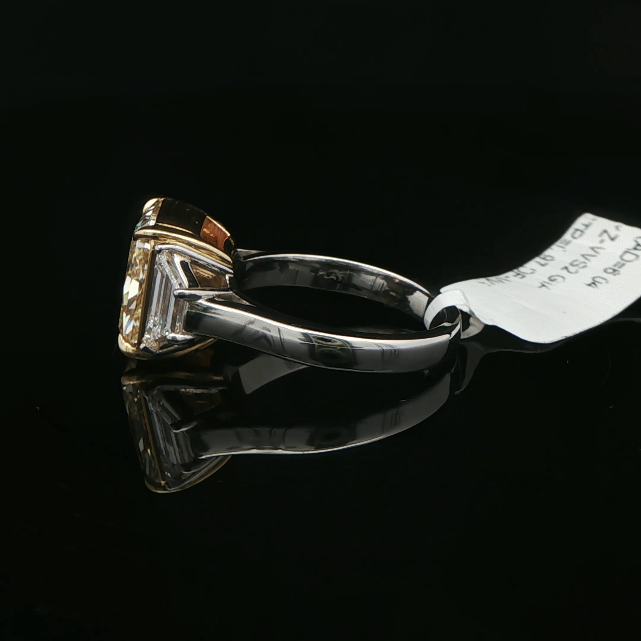 Radiant cut yellow diamond ring detail