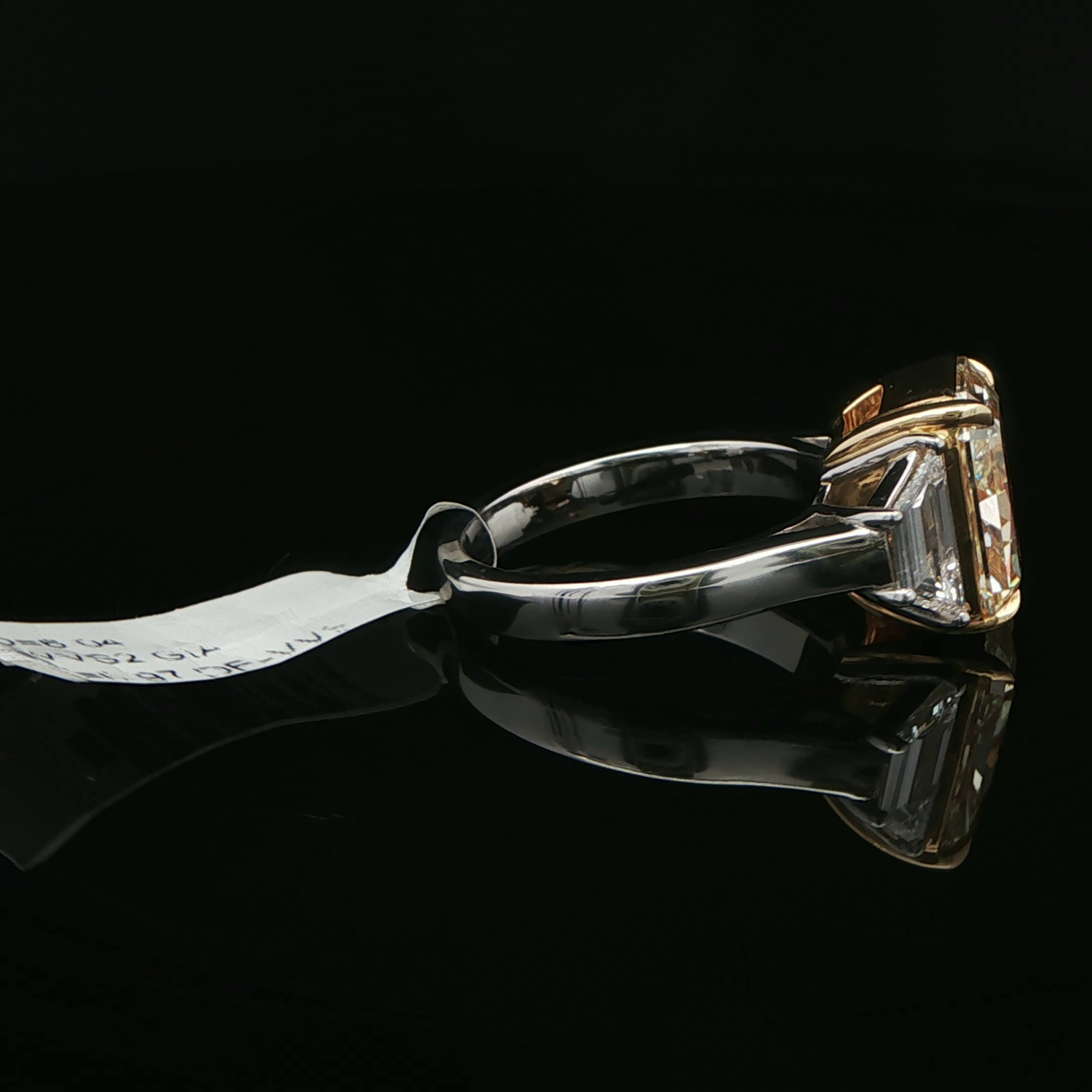 YZ yellow radiant diamond three stone ring display