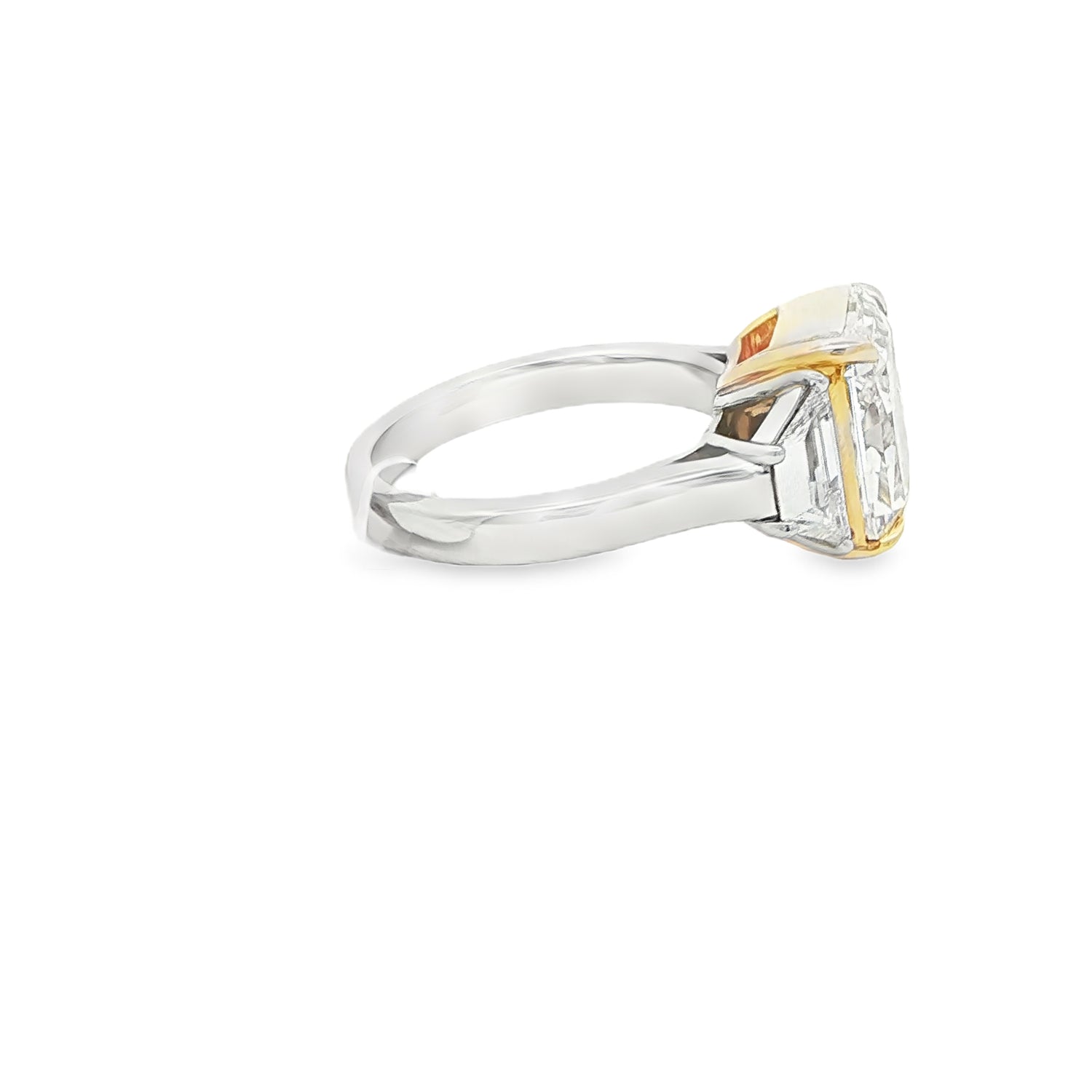 Yellow diamond three stone ring side profile in platinum and 18K yellow gold