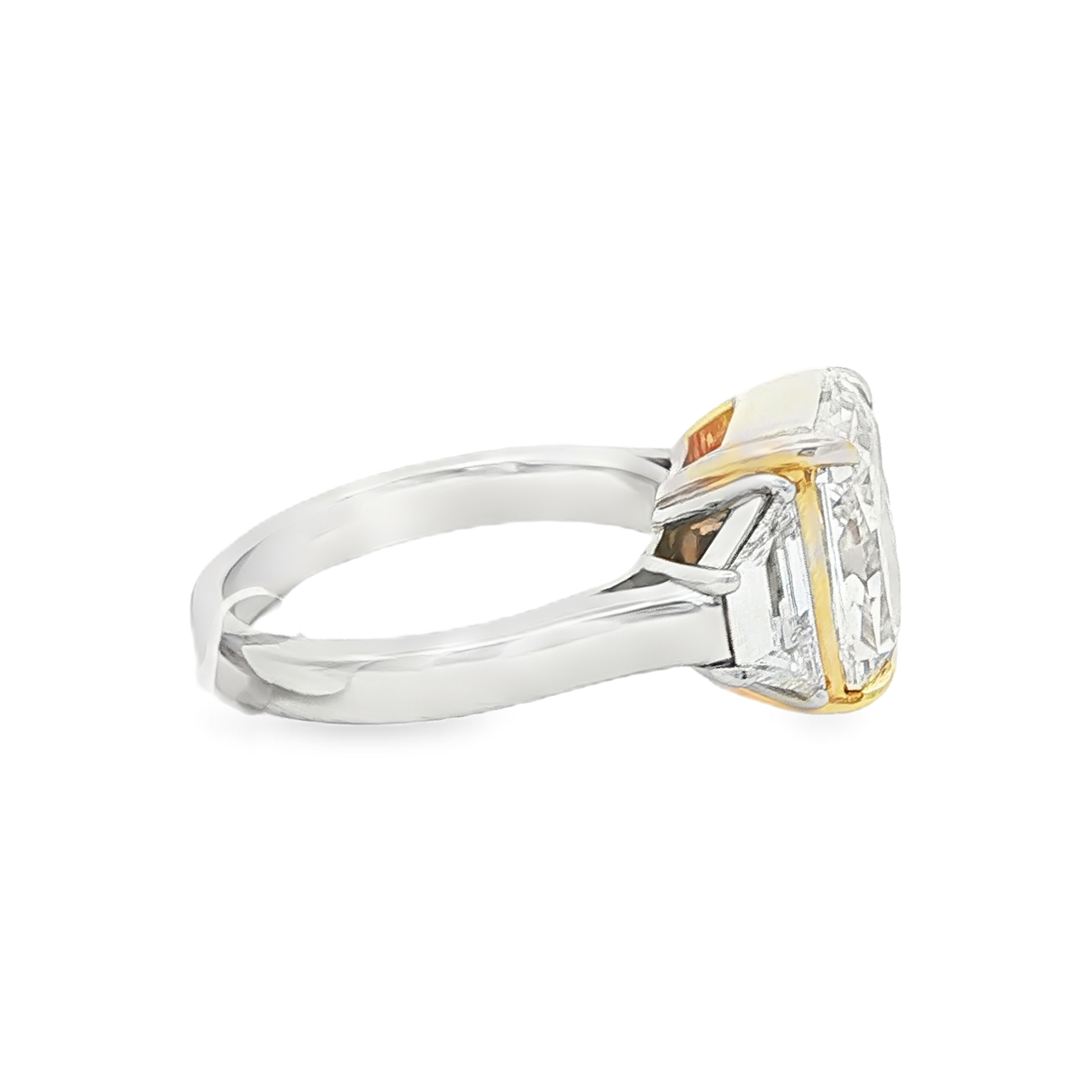 Three stone yellow diamond ring angled side view
