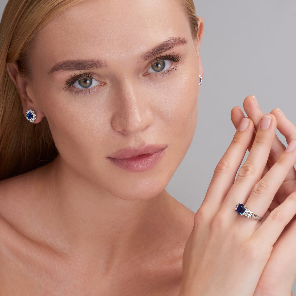 5.85 CT. Sapphire and Round Brilliant Diamond Three Stone Ring in Platinum - worn on model